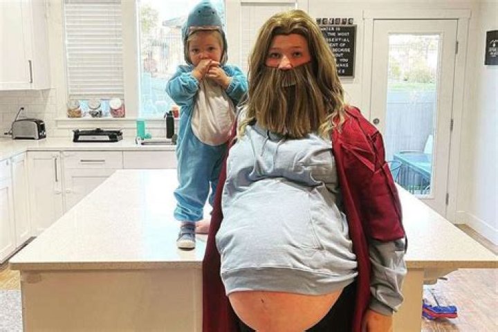 
Pregnant Mykelti Brown Dresses Up in Thor Costume on Halloween with Daughter Avalon as Baby Shark 
